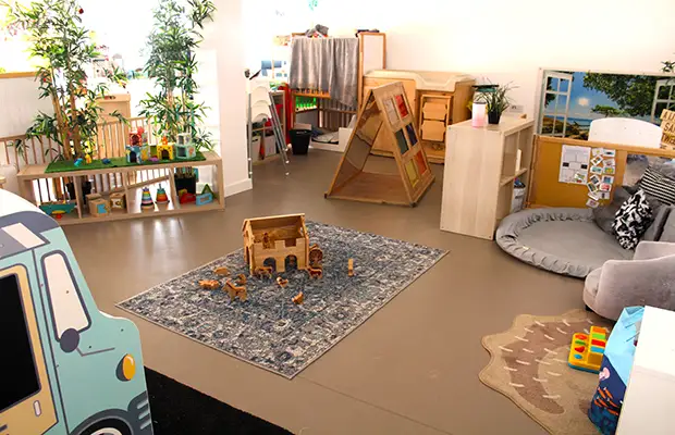 Interior of home from home nursery with toys.